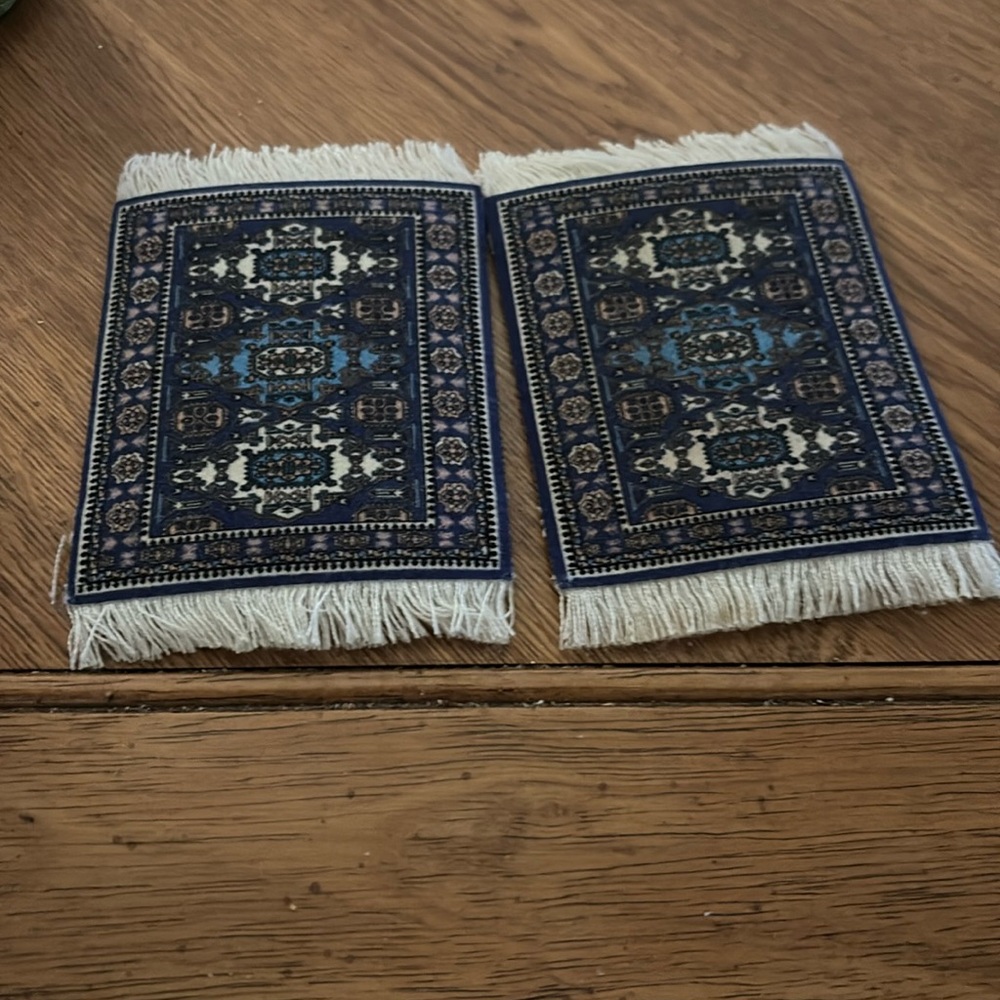Like new. Pair of Rug coasters!